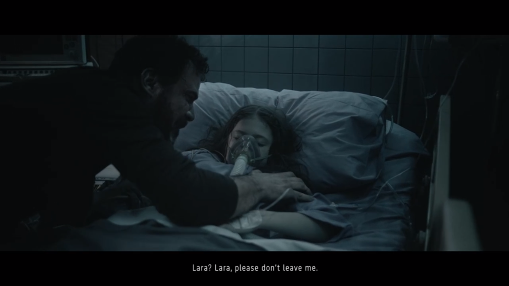 Scene from The Right to Power, showing a father and daughter in hospital